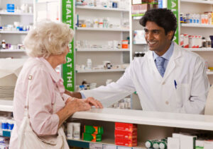 older woman visits pharmacist
